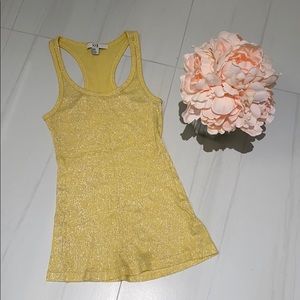 NEVER WORK YELLOW RACERBACK WITH SILVER DETAIL